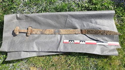 Ancient Viking sword discovered 'sticking up out of the ground' after 1,300 years Education QLD