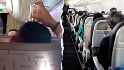 Passenger's bizarre use of drinking glass on flight leaves travelers horrified Education QLD