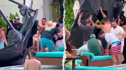 Terrifying scene unfolds as metal cabana frame crashes into packed casino pool area Education QLD
