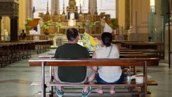 Tourist's church clothing hack leaves travelers sharply divided over sacred-site etiquette Education Gold Coast